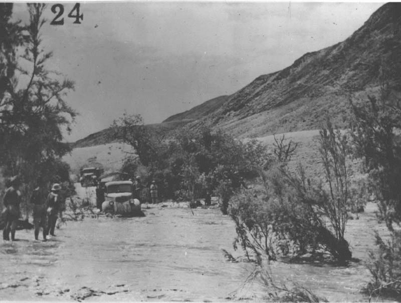 Convoy crossing Gumatum river in flood